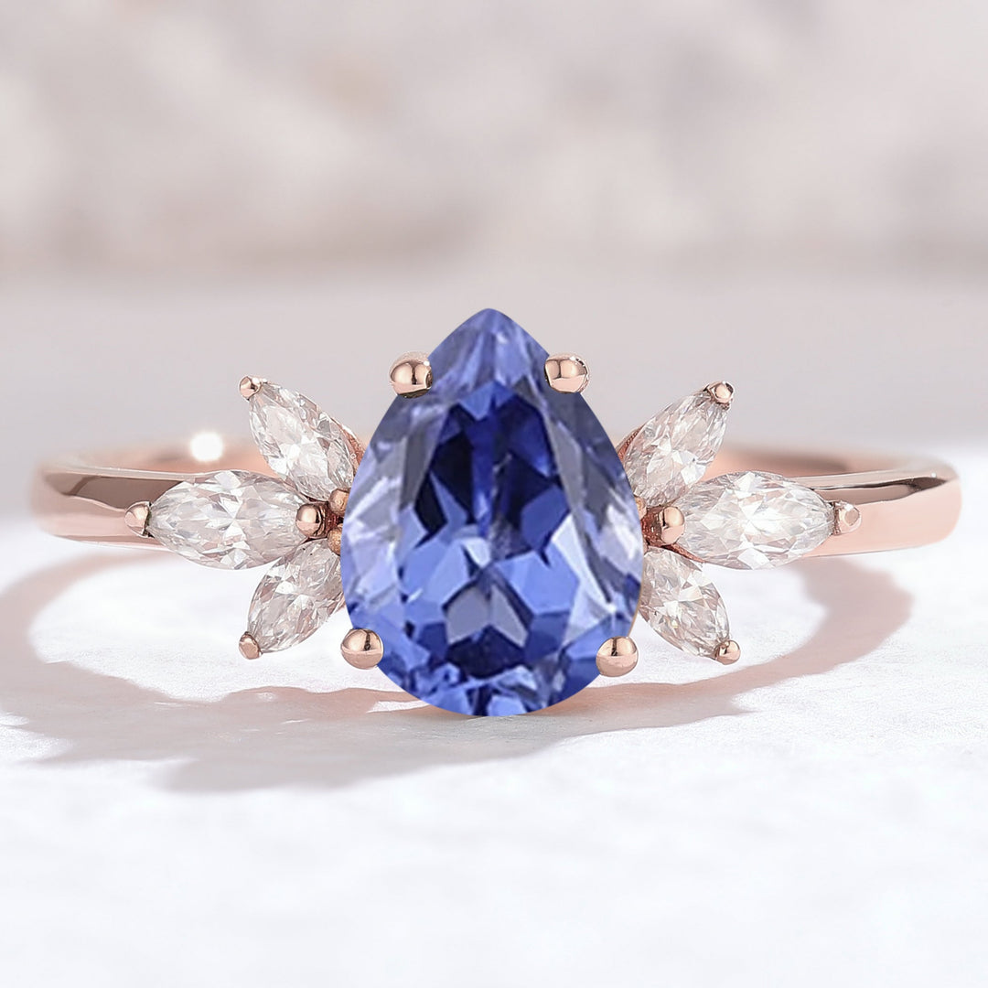 NatureInspiredPearCutCornflowerSapphirewithPetalSideEngagementRing_2