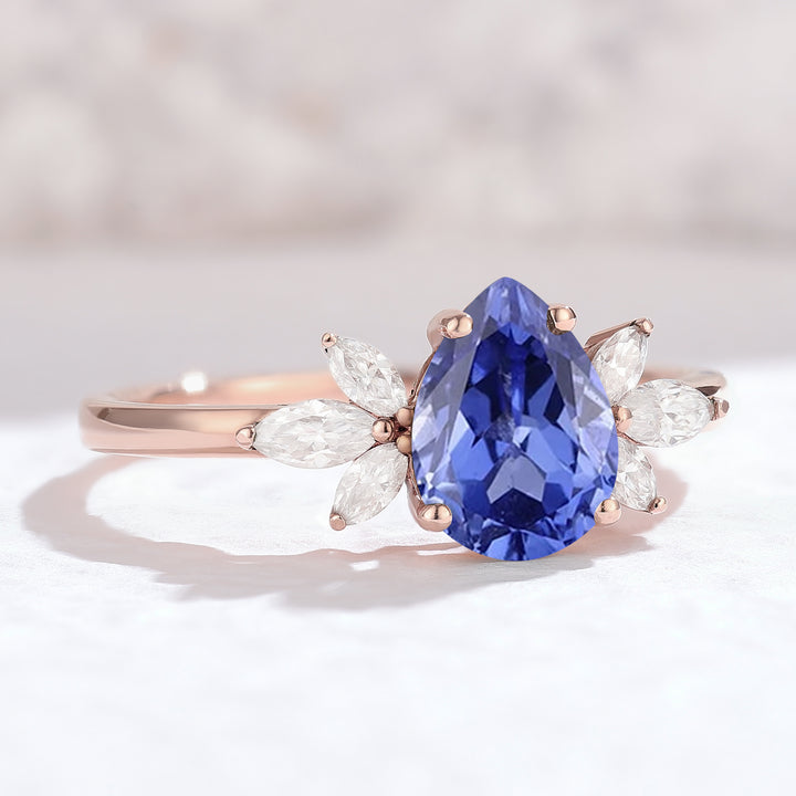 Nature Inspired Pear Cut Cornflower Sapphire with Petal Side Gemstone Ring - Iver Jewelry