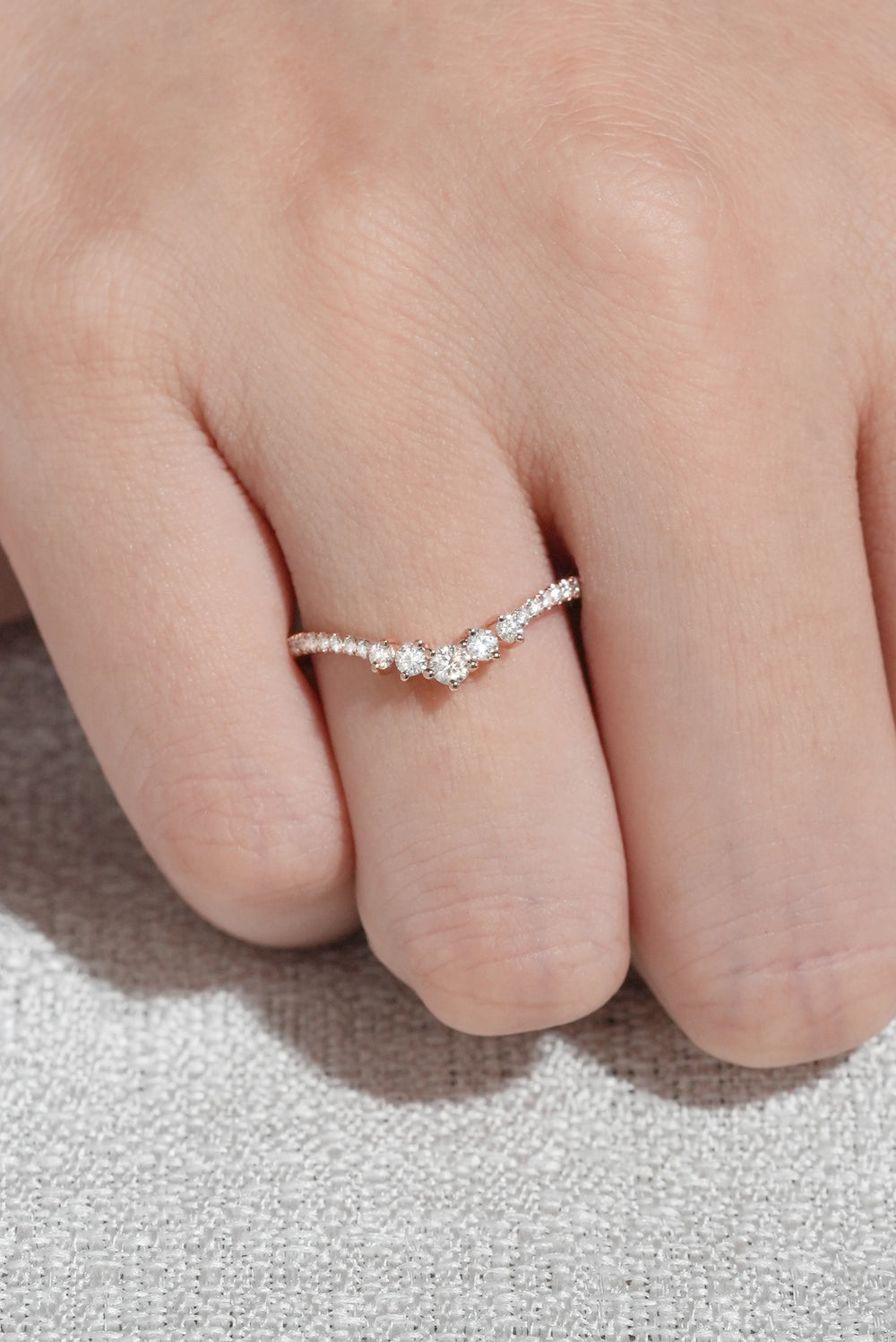 Curved Round Cut Moissanite Rose Gold Ring