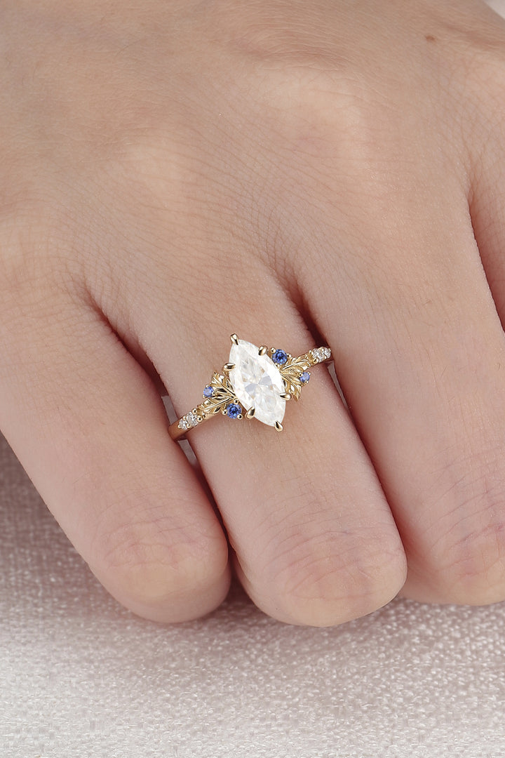Nature Inspired Leaf Claw Inlay Marquise Cut Moissanite Gemstone Ring