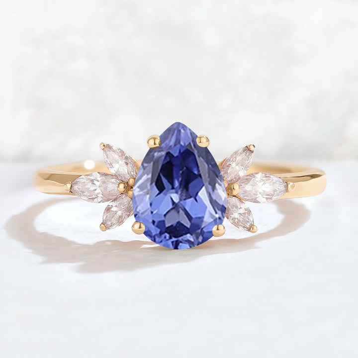 Nature Inspired Pear Cut Cornflower Sapphire with Petal Side Gemstone Ring