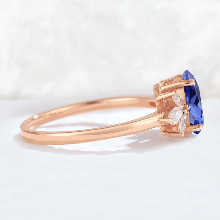 Nature Inspired Pear Cut Cornflower Sapphire with Petal Side Gemstone Ring