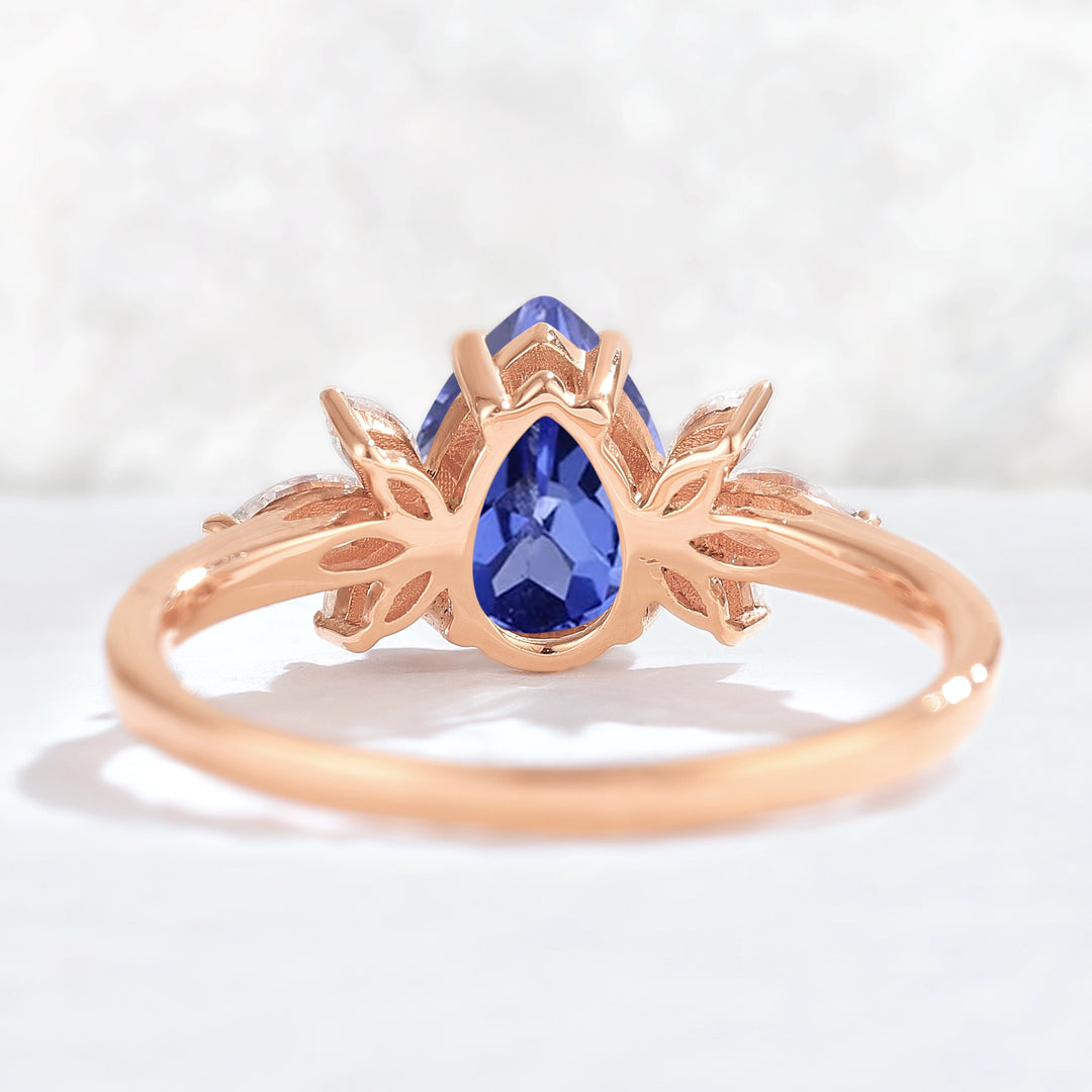 Nature Inspired Pear Cut Cornflower Sapphire with Petal Side Gemstone Ring