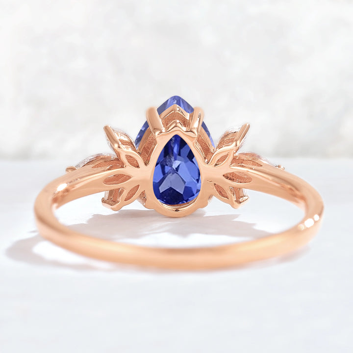 Nature Inspired Pear Cut Cornflower Sapphire with Petal Side Gemstone Ring