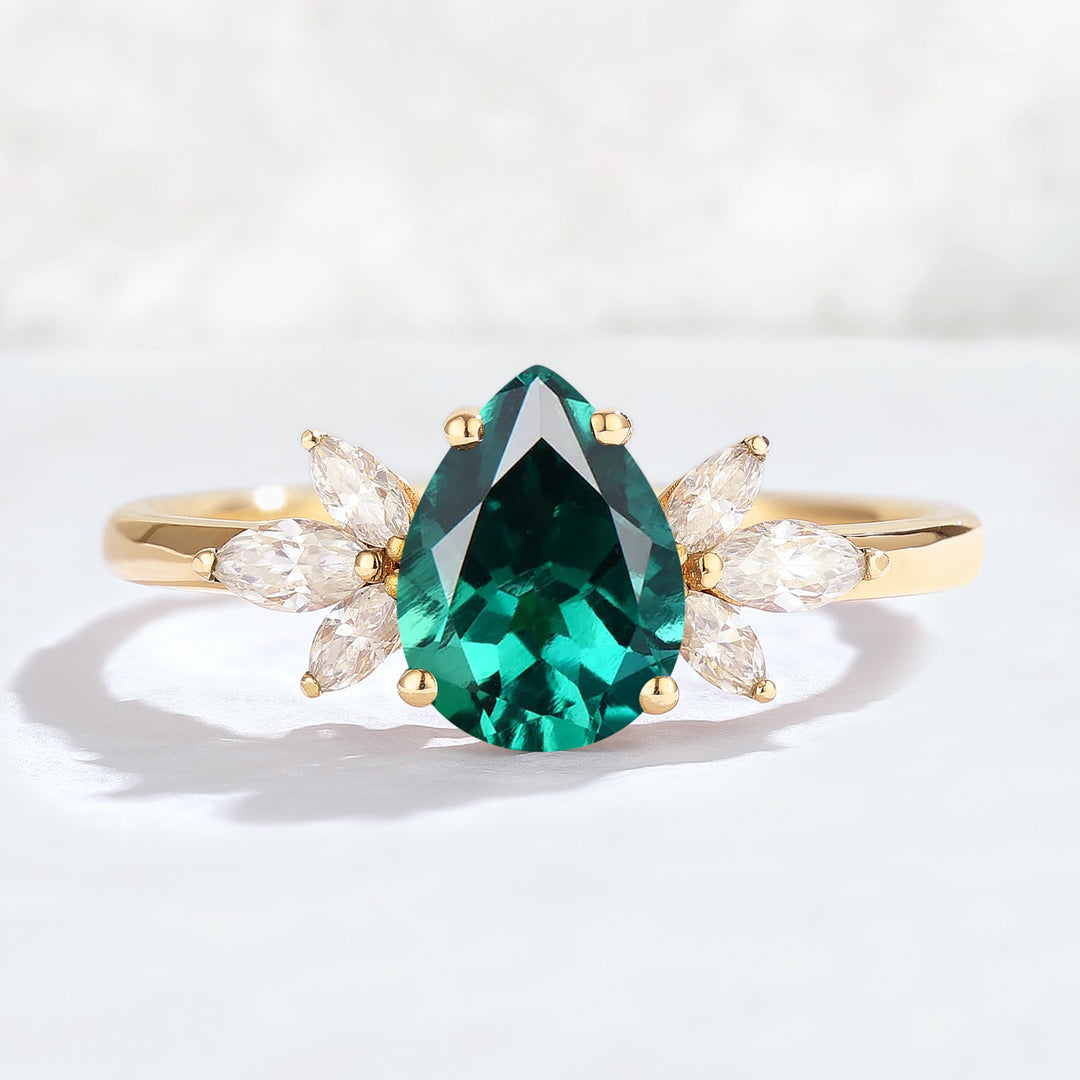 Nature Inspired Pear Cut Emerald with Petal Side Gemstone Ring