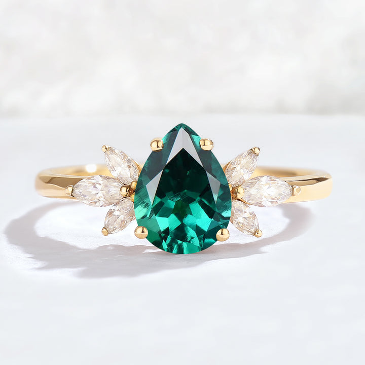 Nature Inspired Pear Cut Emerald with Petal Side Gemstone Ring