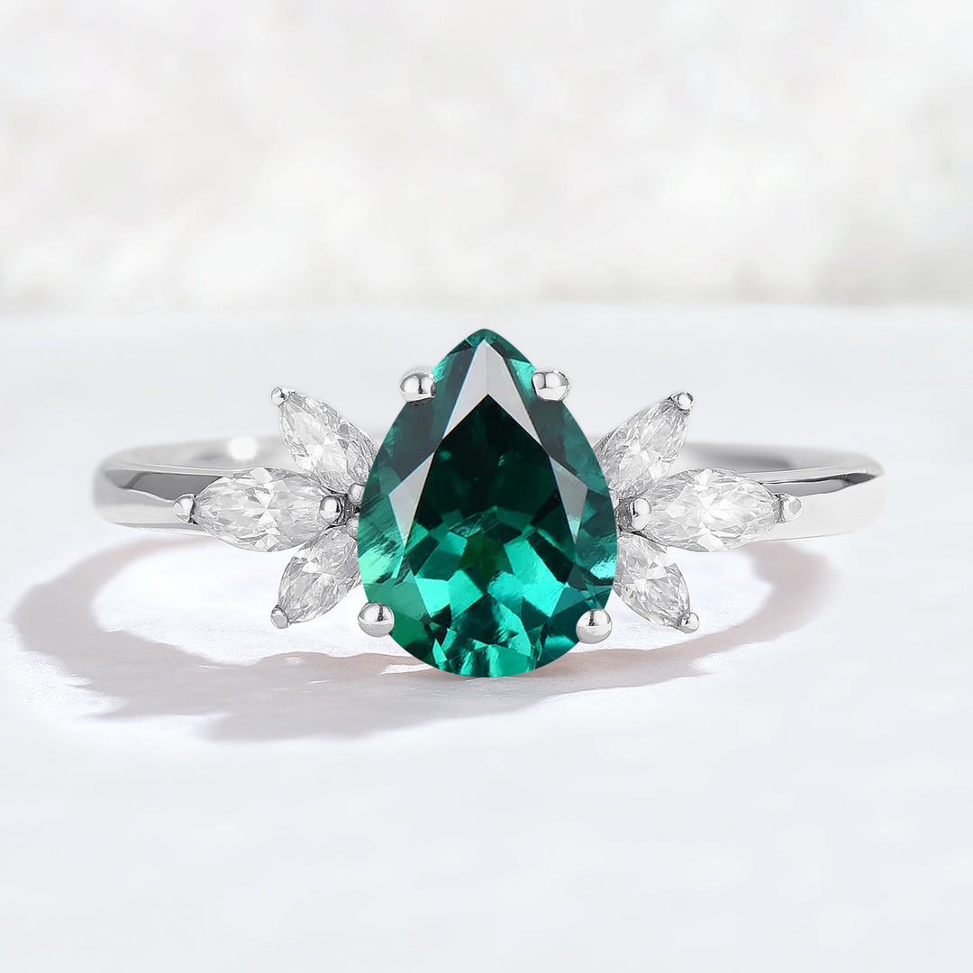 Nature Inspired Pear Cut Emerald with Petal Side Gemstone Ring