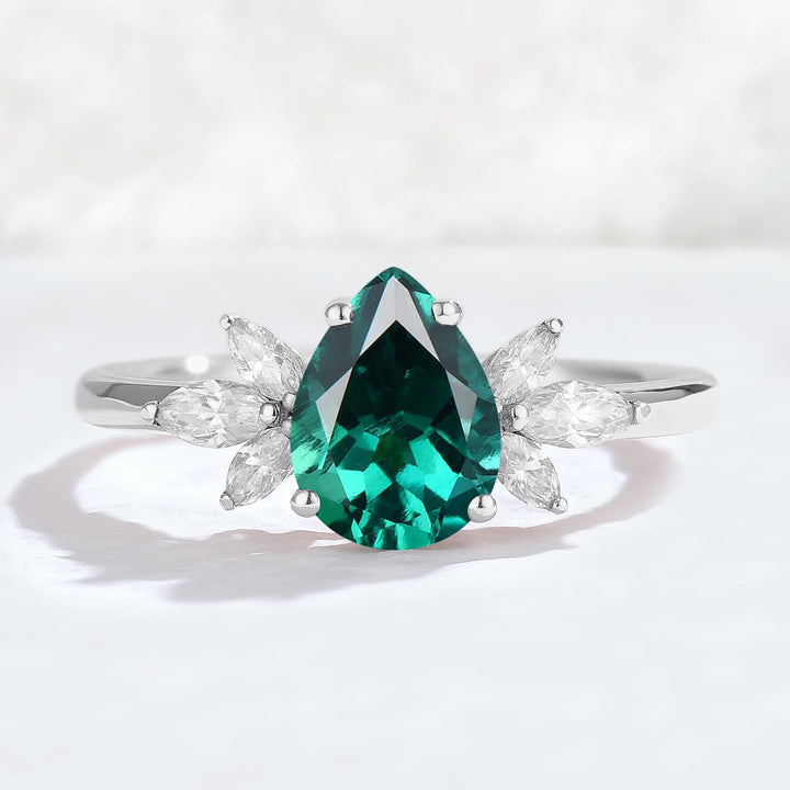 Nature Inspired Pear Cut Emerald with Petal Side Gemstone Ring