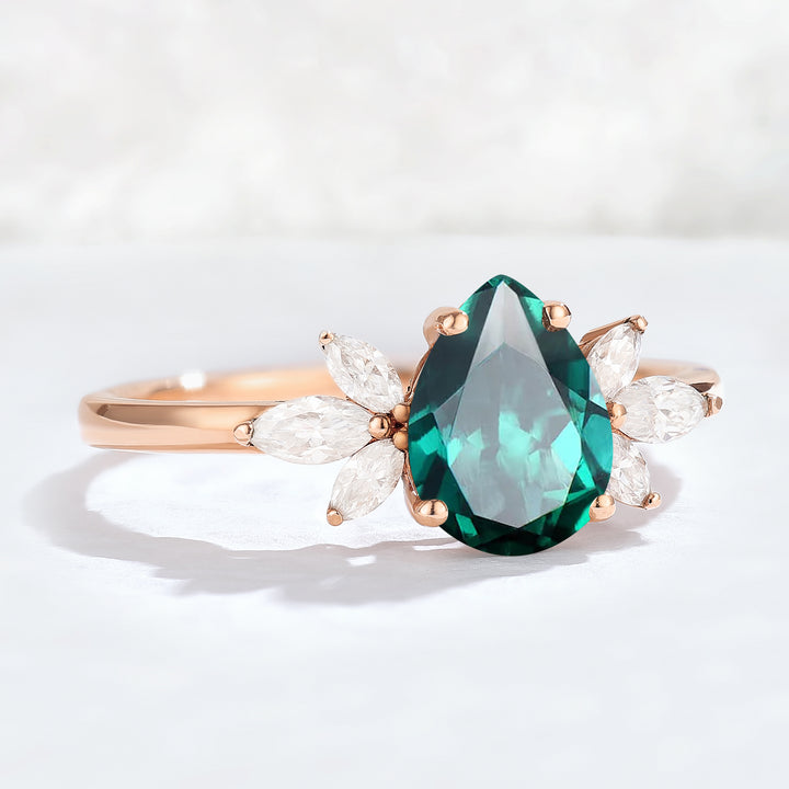Nature Inspired Pear Cut Emerald with Petal Side Gemstone Ring