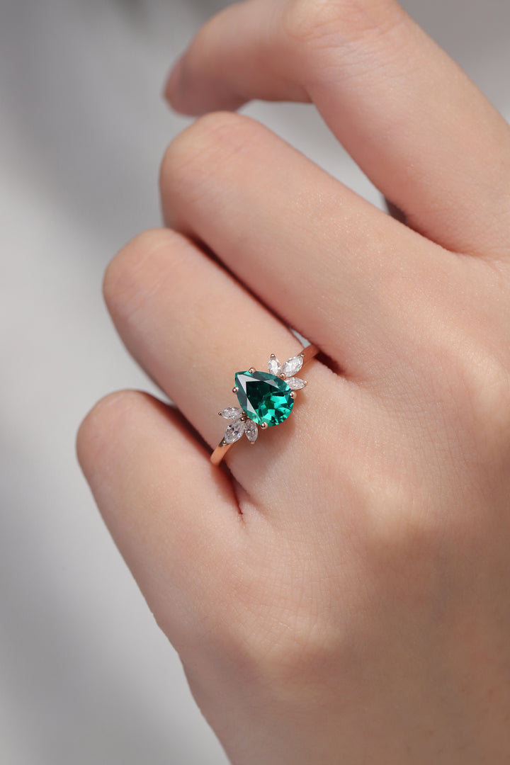 Nature Inspired Pear Cut Emerald with Petal Side Gemstone Ring