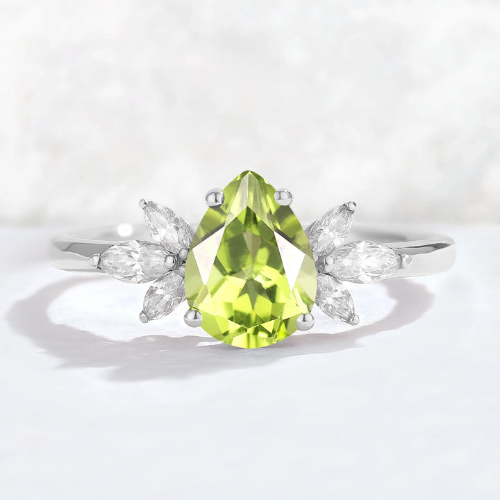 Nature Inspired Pear Cut Peridot with Petal Side Gemstone Ring