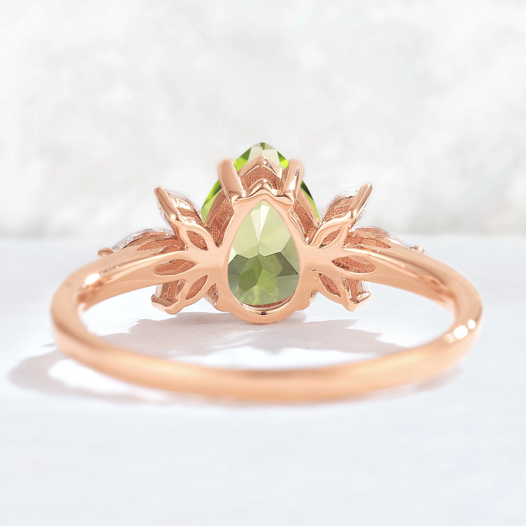 Nature Inspired Pear Cut Peridot with Petal Side Gemstone Ring