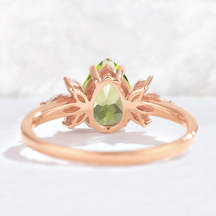 Nature Inspired Pear Cut Peridot with Petal Side Gemstone Ring