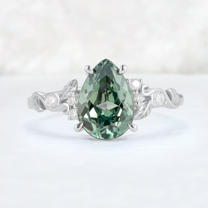 Nature Inspired Pear Cut Sapphire and Moissanite Silver Gemstone Ring
