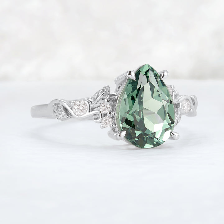 Nature Inspired Pear Cut Sapphire and Moissanite Silver Gemstone Ring
