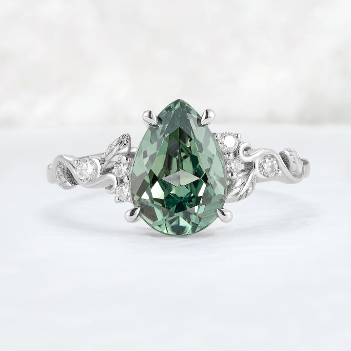 Nature Inspired Pear Cut Sapphire and Moissanite Silver Gemstone Ring