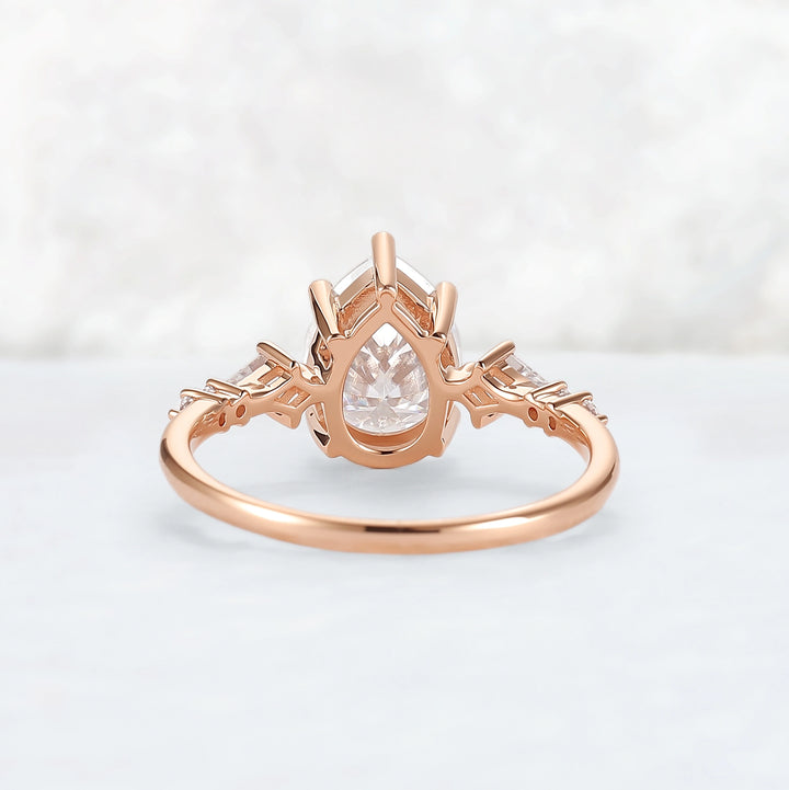 Simple Pear Shaped Moissanite Cluster Engagement Ring