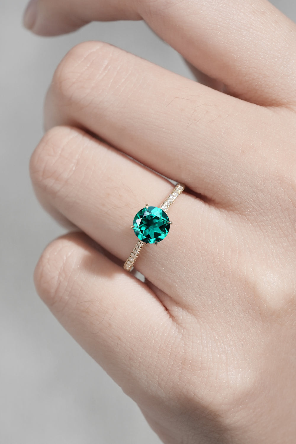 Timeless Round Cut Emerald Half Enternity Engagement Ring-1