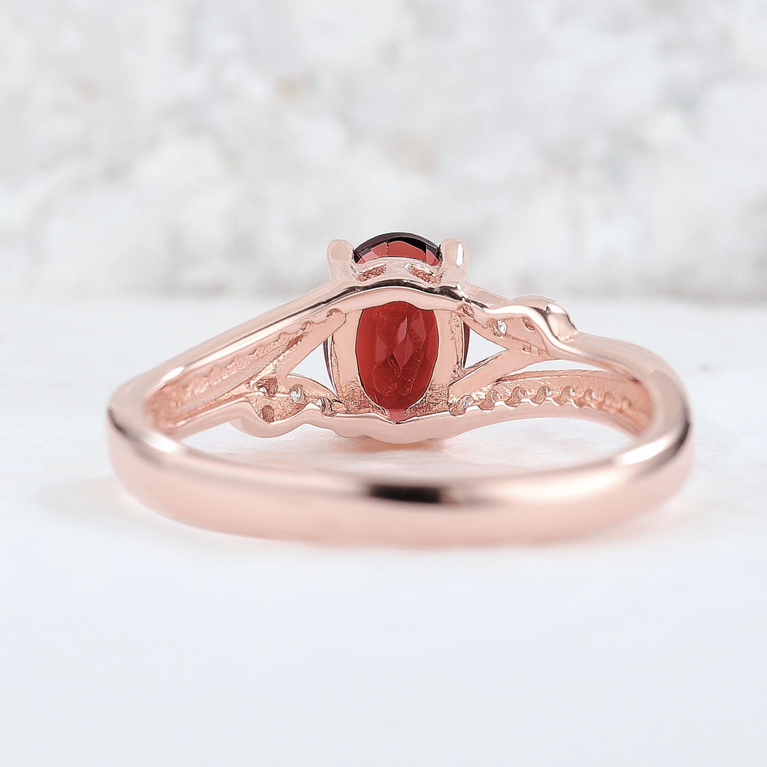 Unique Oval Shaped Garnet Vine Engagement Ring