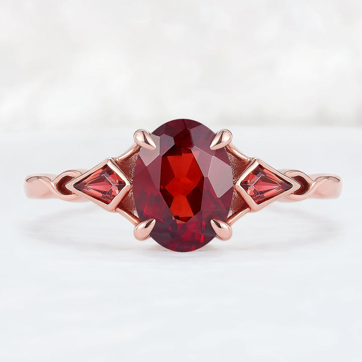 Unique Oval Shaped Garnet Three Stone Engagement Ring