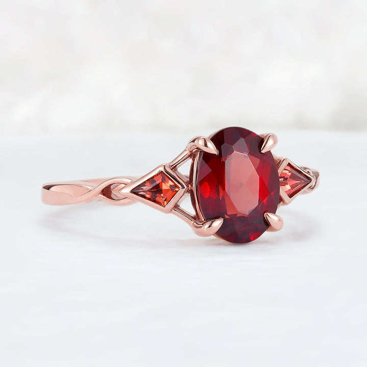 Unique Oval Shaped Garnet Three Stone Engagement Ring