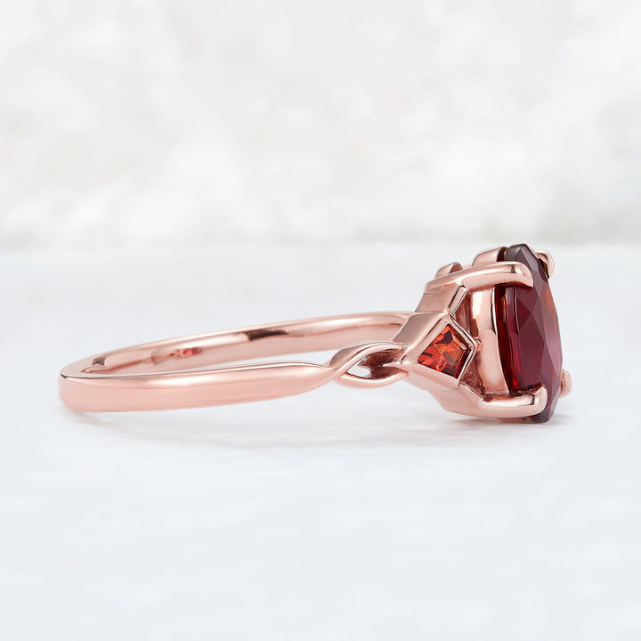 Unique Oval Shaped Garnet Three Stone Engagement Ring
