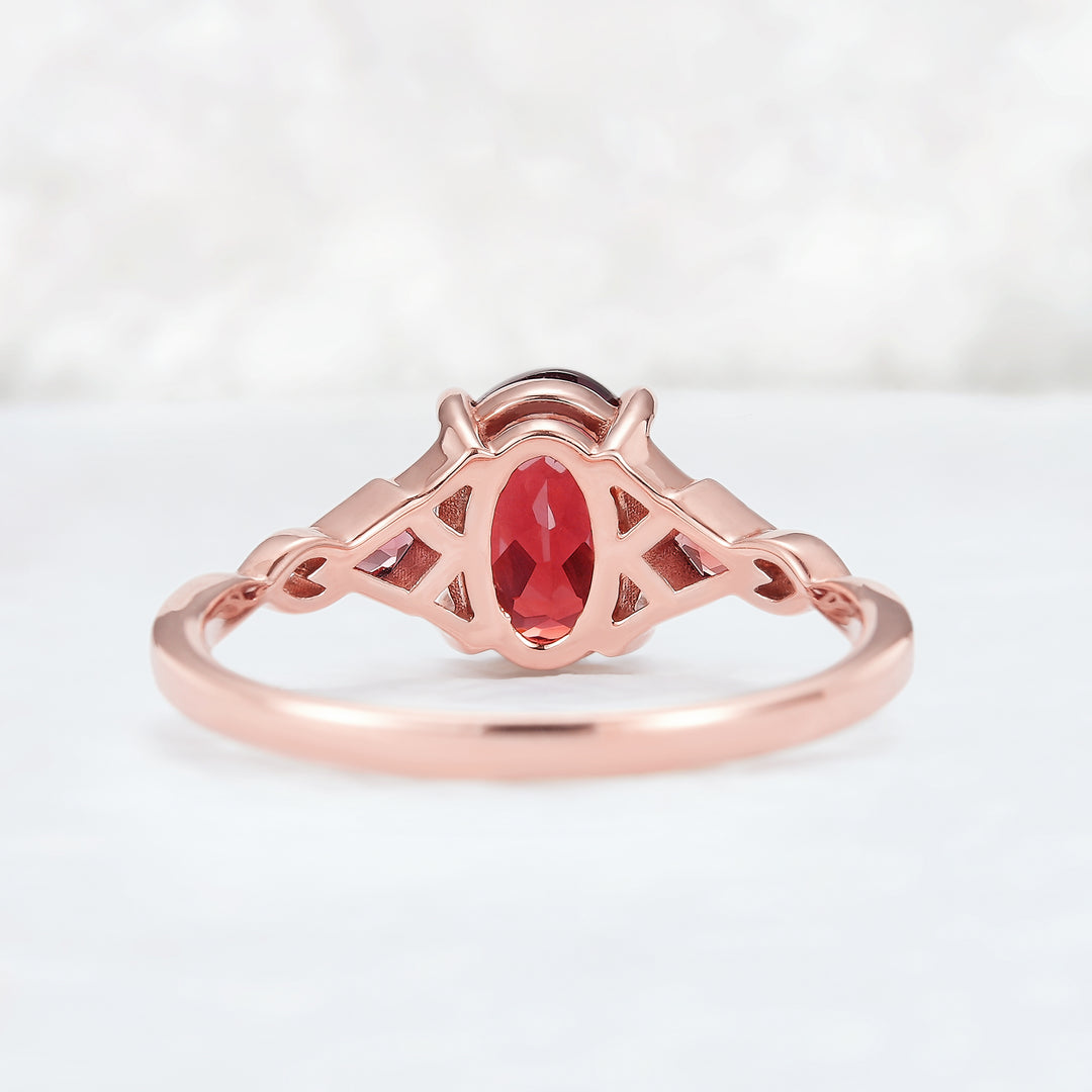 Unique Oval Shaped Garnet Three Stone Engagement Ring