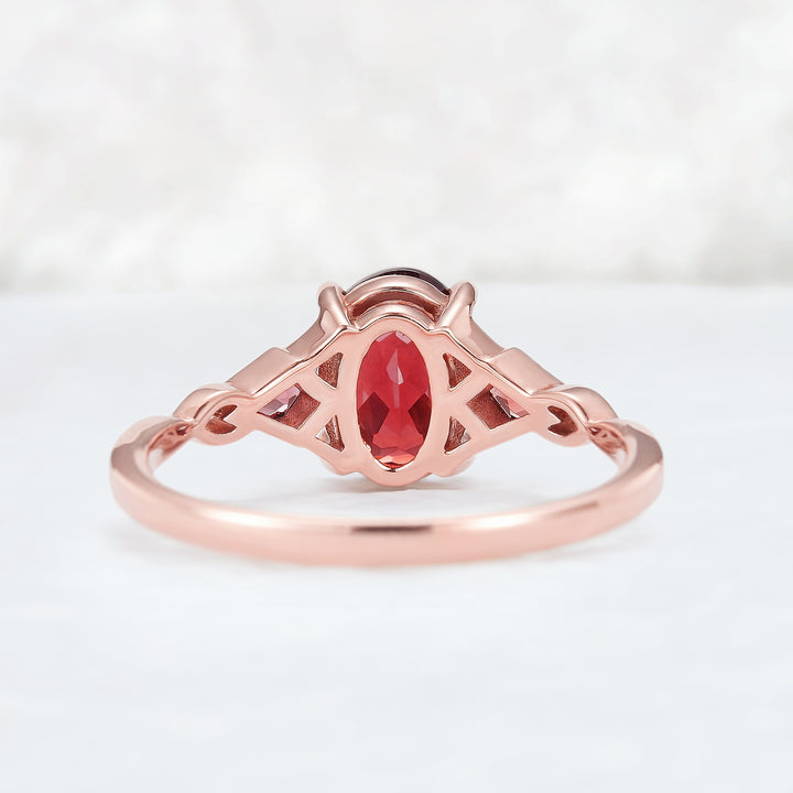 Unique Oval Shaped Garnet Three Stone Engagement Ring
