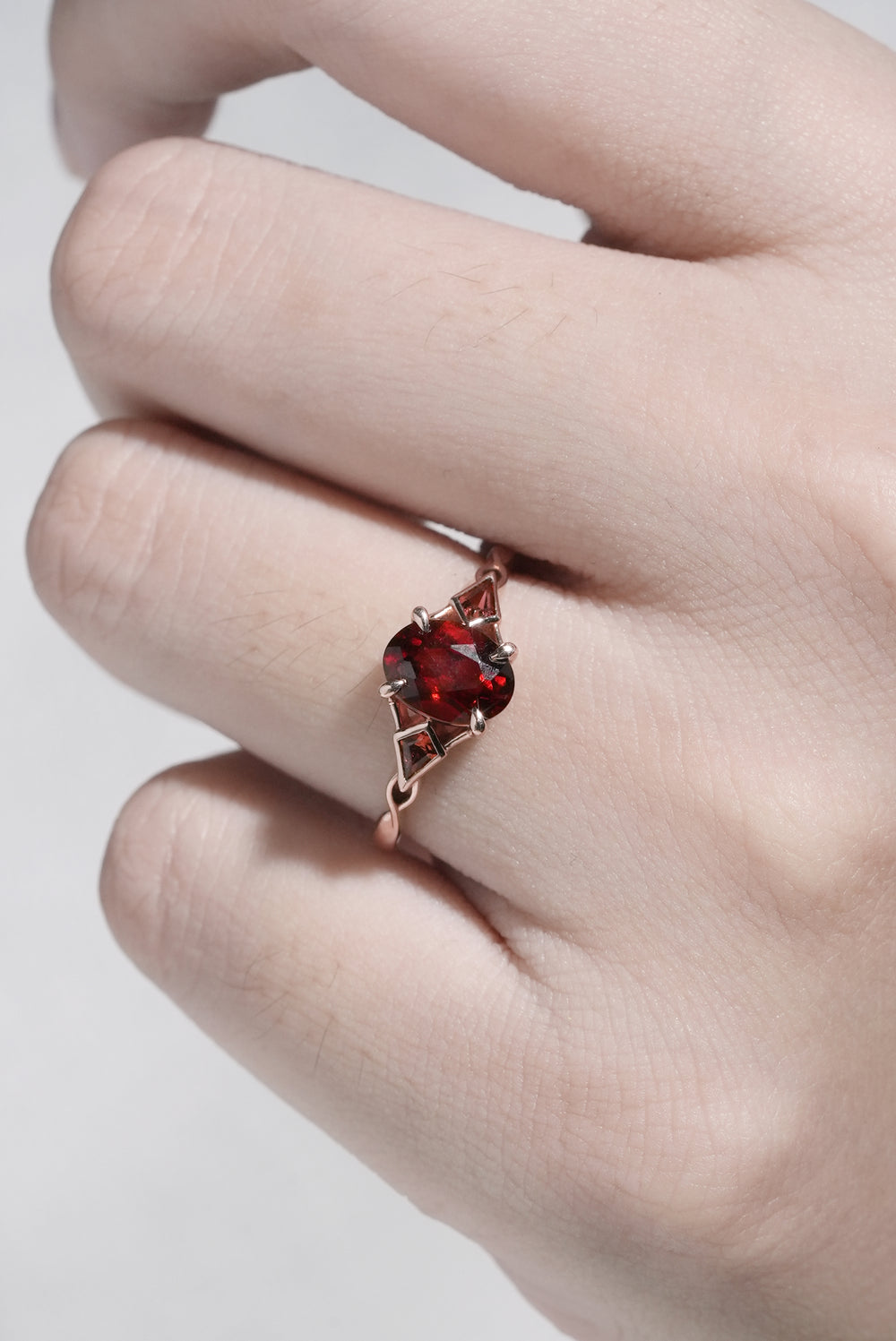 Unique Oval Shaped Garnet Three Stone Engagement Ring