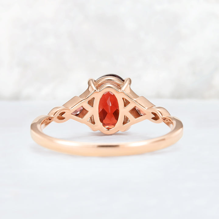 Unique Oval Shaped Garnet Three Stone Gemstone Ring