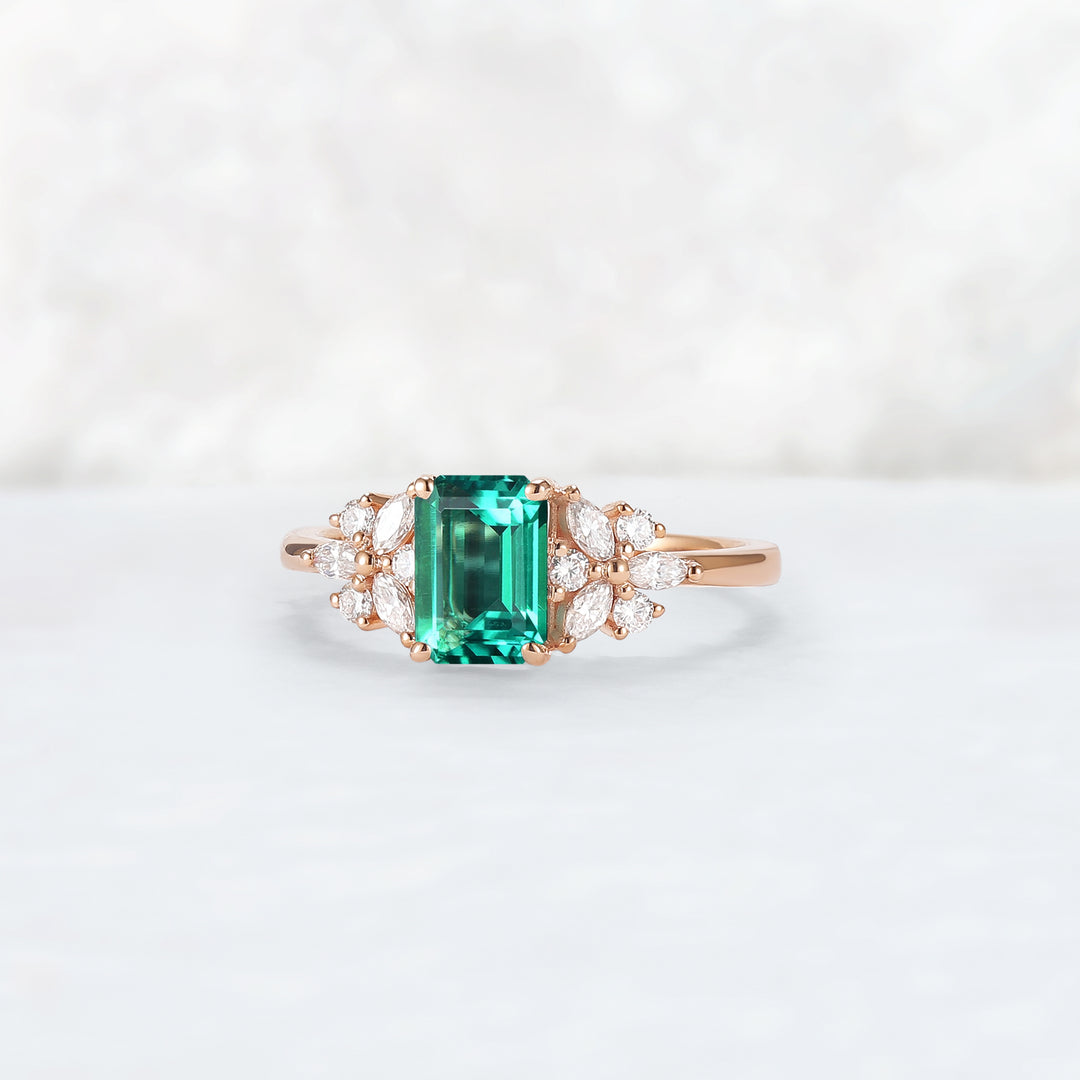 Nature Inspired Emerald Cut Emerald Ring with Petal Moissanite Side Stones