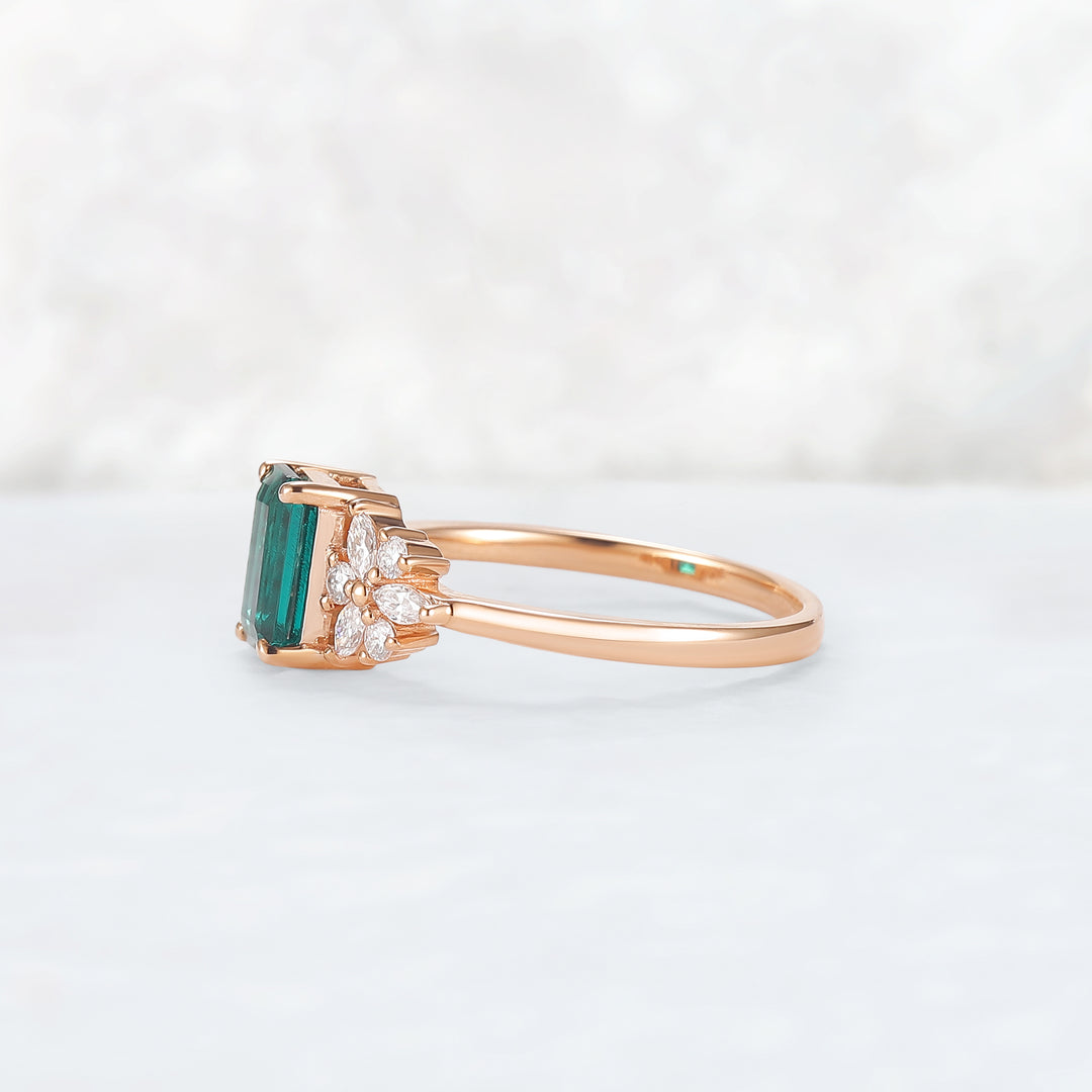 Nature Inspired Emerald Cut Emerald Ring with Petal Moissanite Side Stones