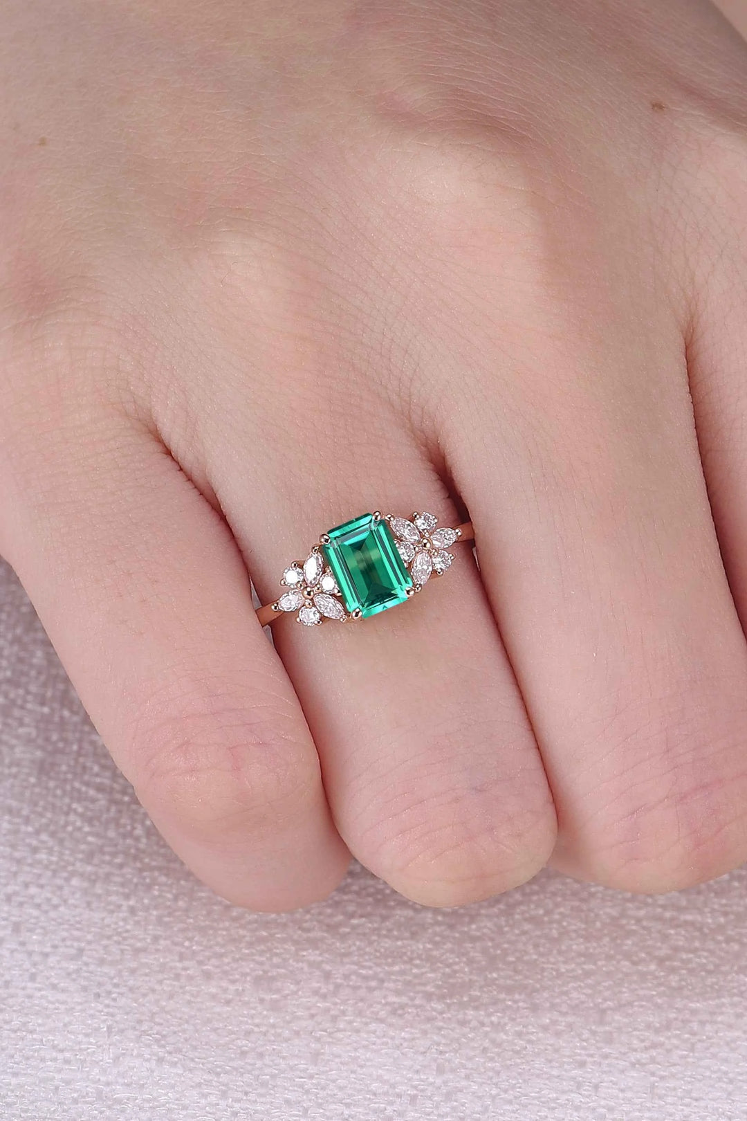 Nature Inspired Emerald Cut Emerald Ring with Petal Moissanite Side Stones