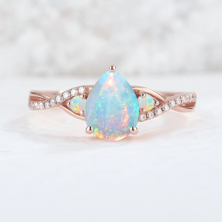 Unique Pear Cut Opal Twisted Engagement Ring